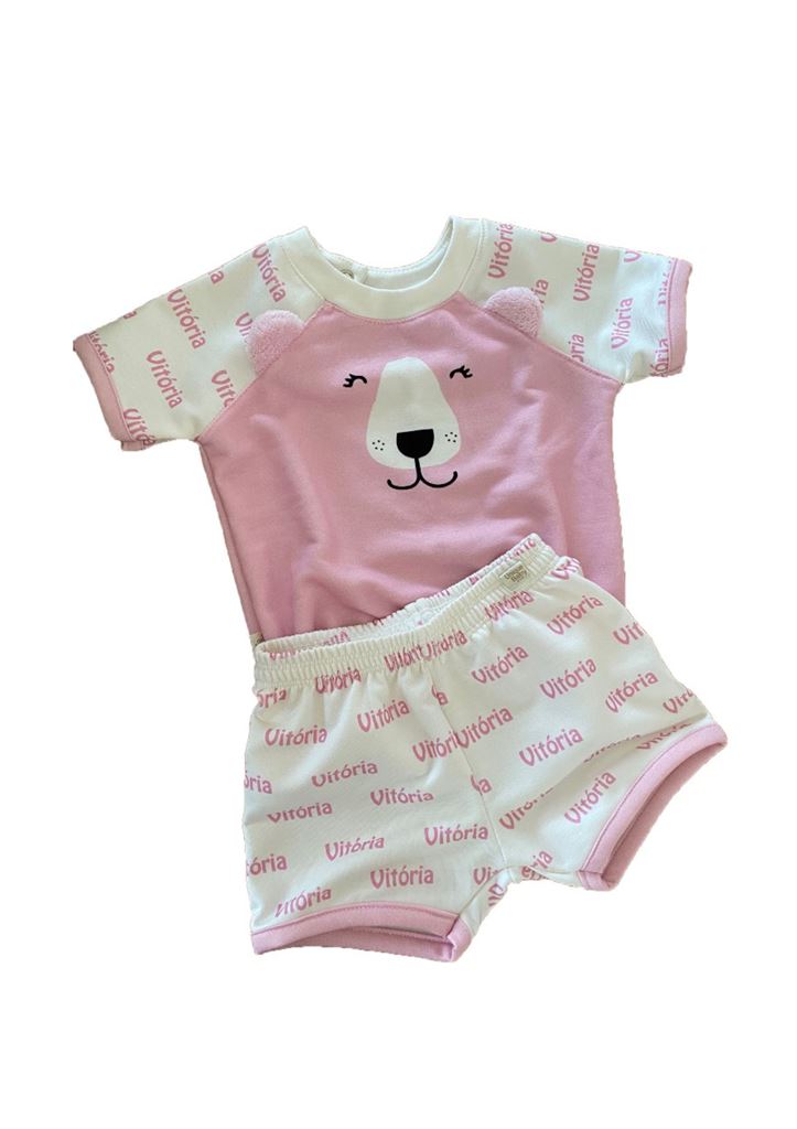 pijama infantil nas cores brancas e rosa com estampa de urso